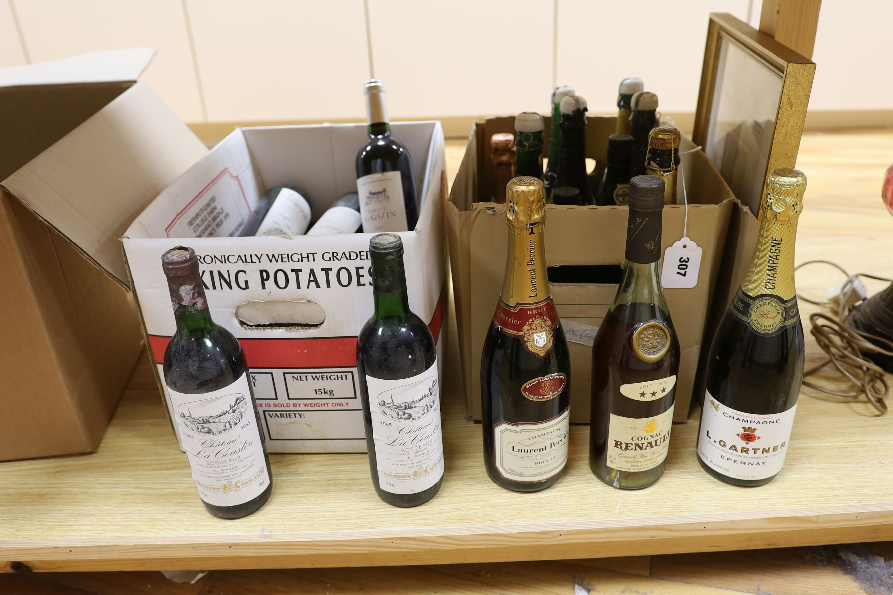 A group of wines and champagnes including Chateau La Coustere, Laurent-Perrier, L.Gardner and a bottle of Renault cognac